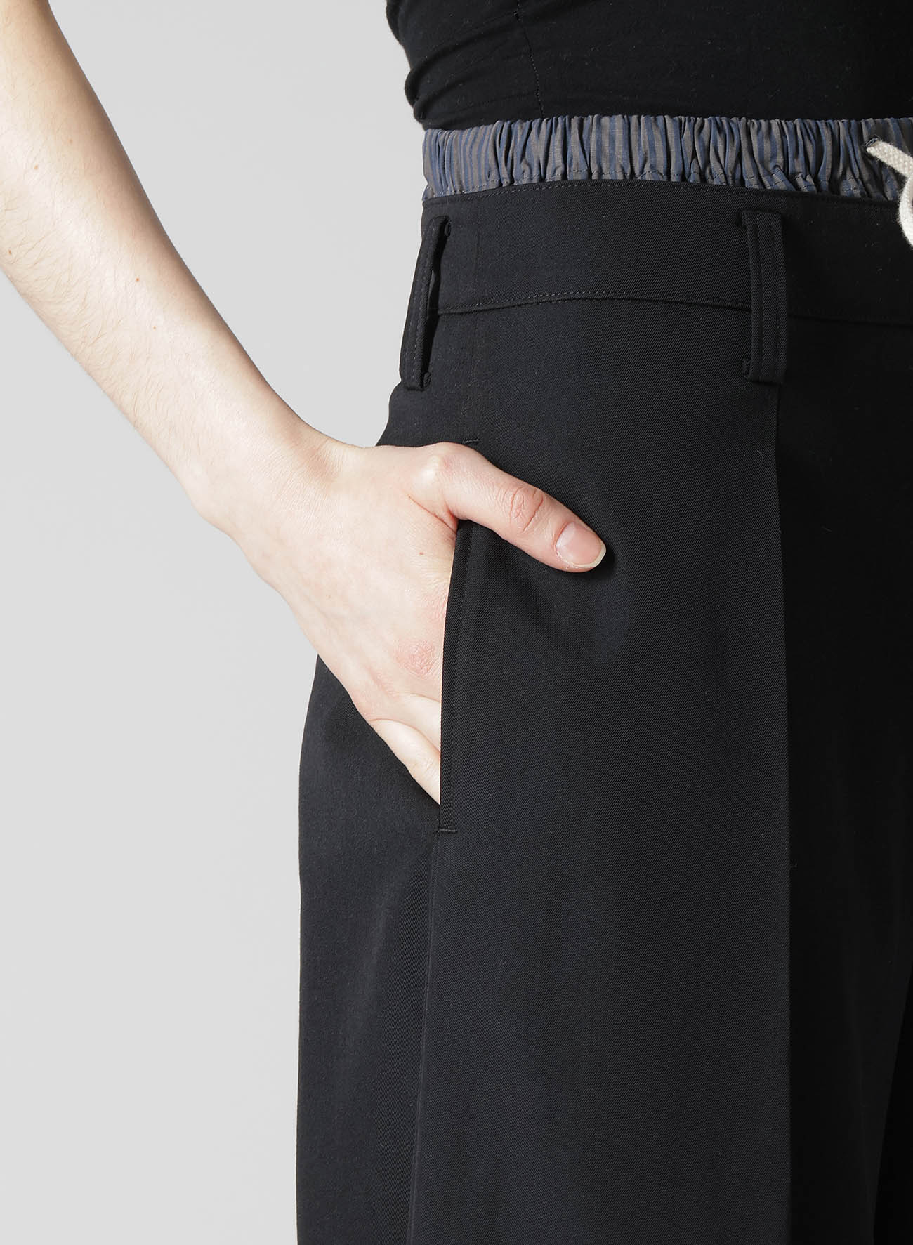 GABARDINE LAYERED-LIKE WIDE PANTS
