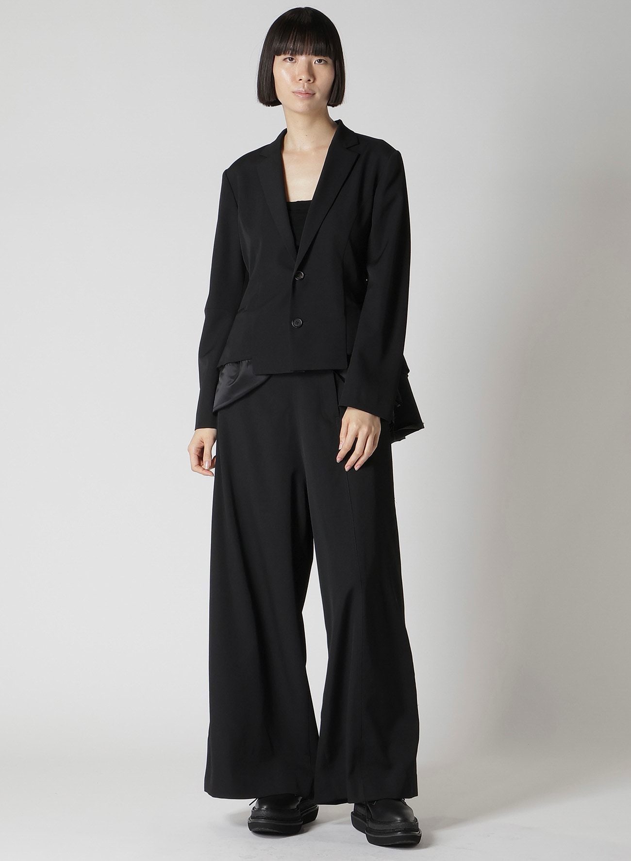 GABARDINE ASYMMETRY BAGGY PANTS