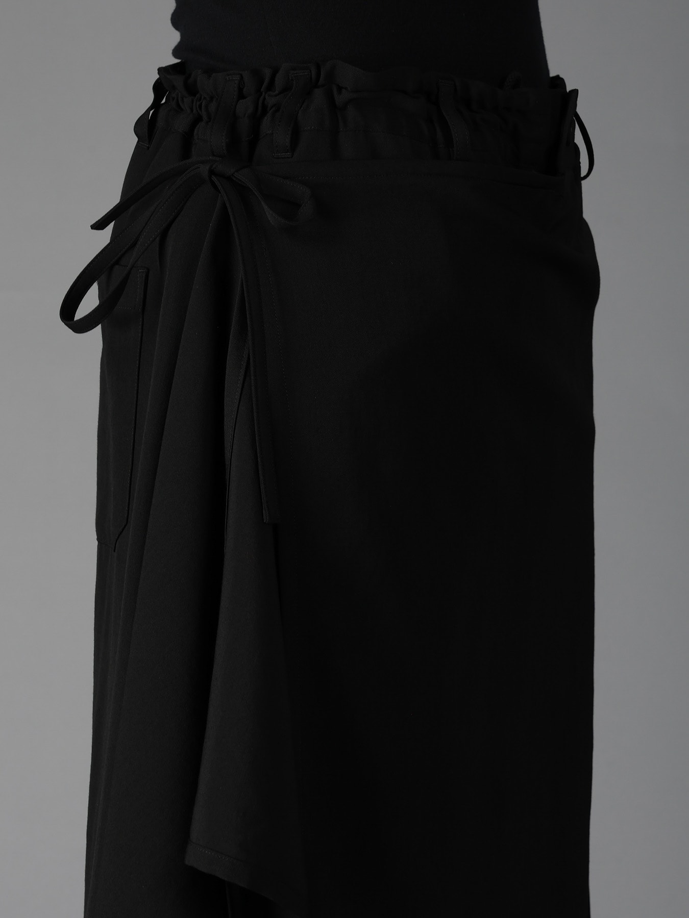 WOOL GABARDINE BOUND SKIRT PANTS