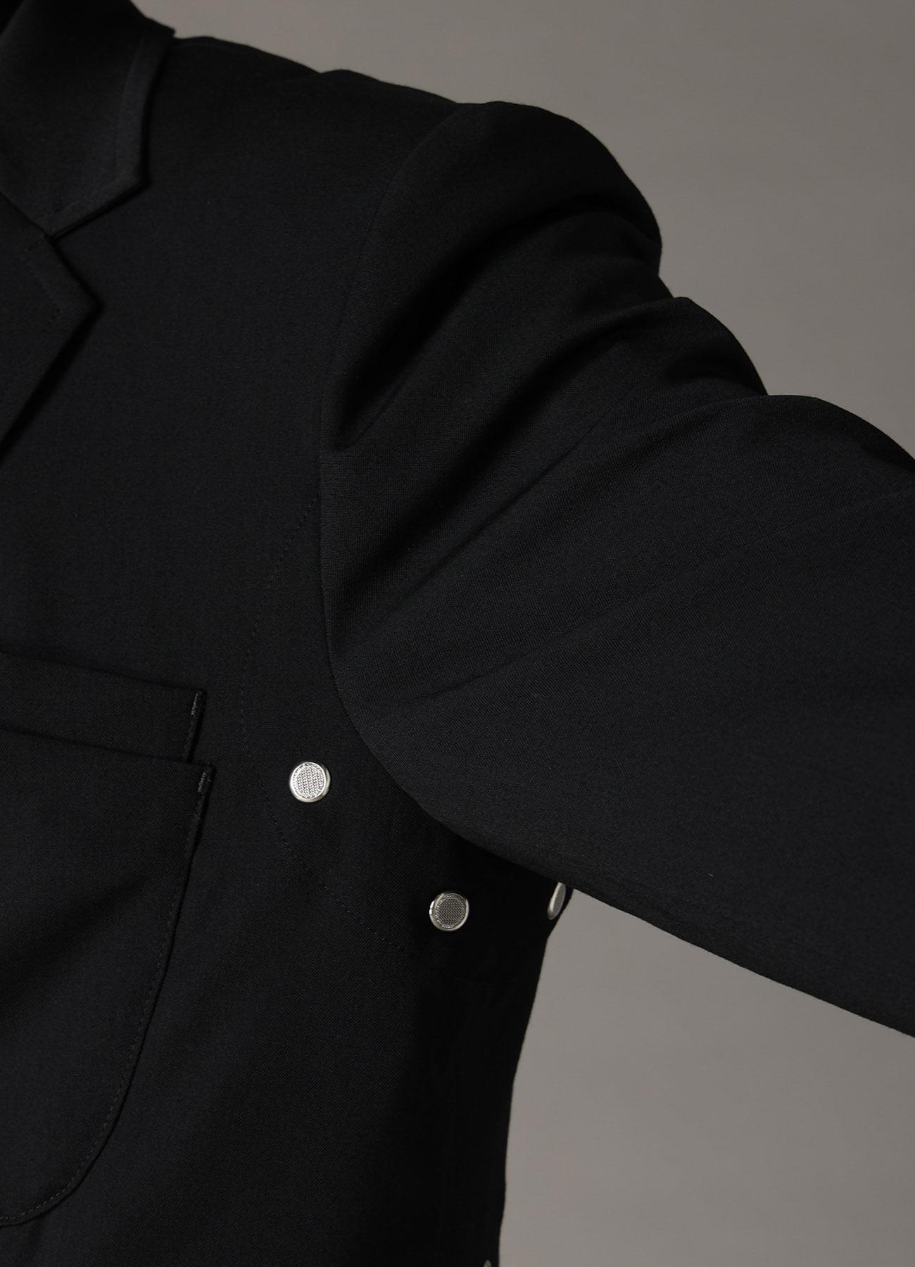WOOL GABARDINE JACKET WITH EYELETS AND BACK BELT