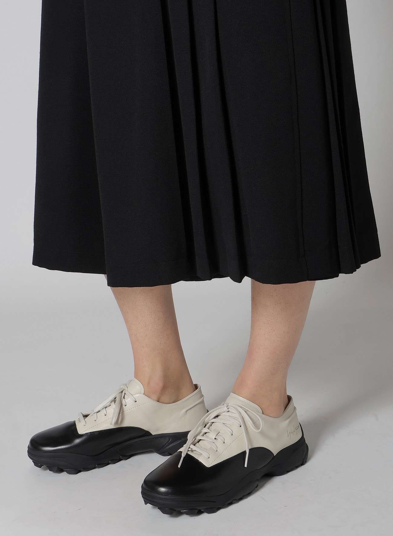 ARMY GABARDINE PLEATS SKIRT PANTS