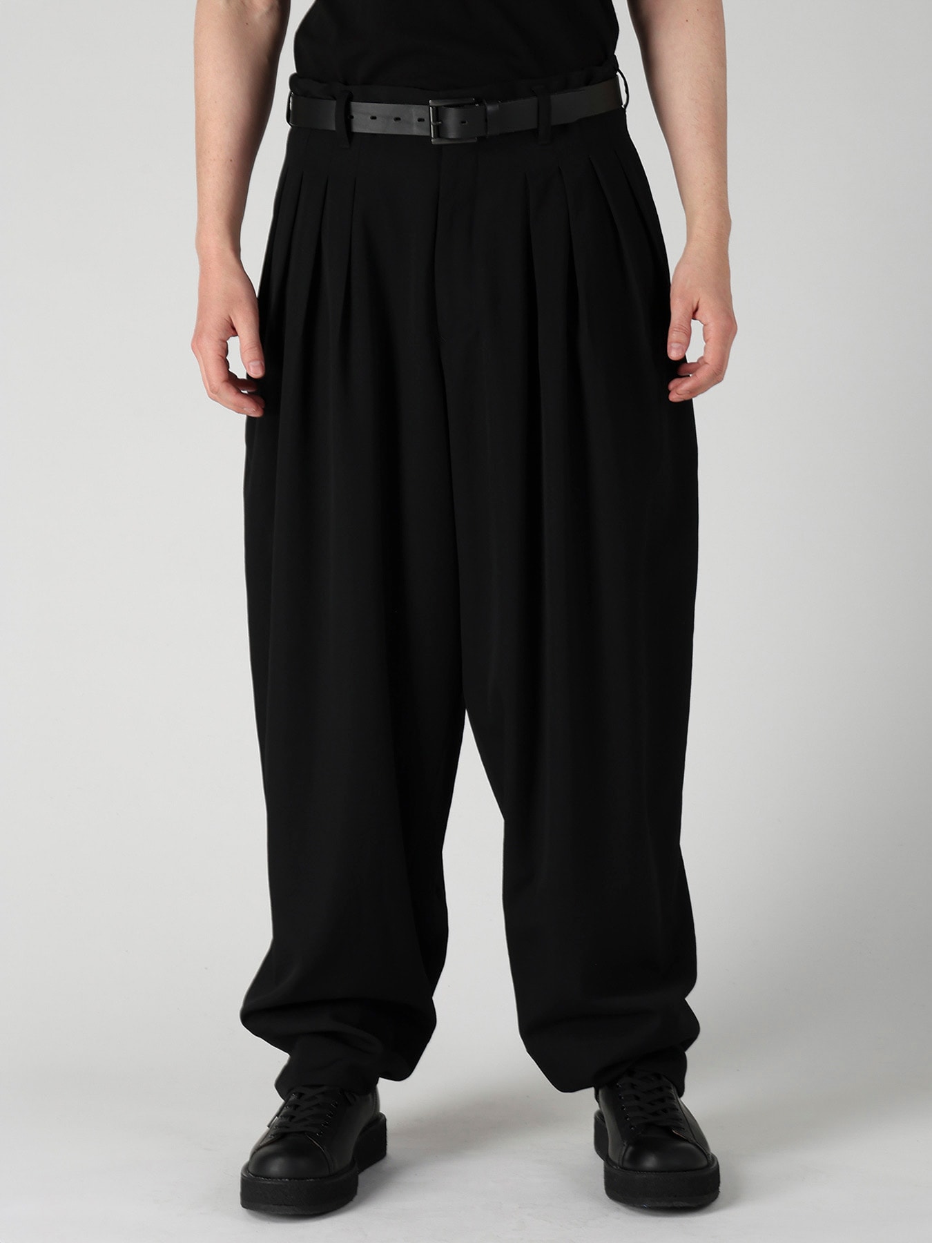 WOOL GABARDINE 16 TUCKS STACKED HEM PANTS