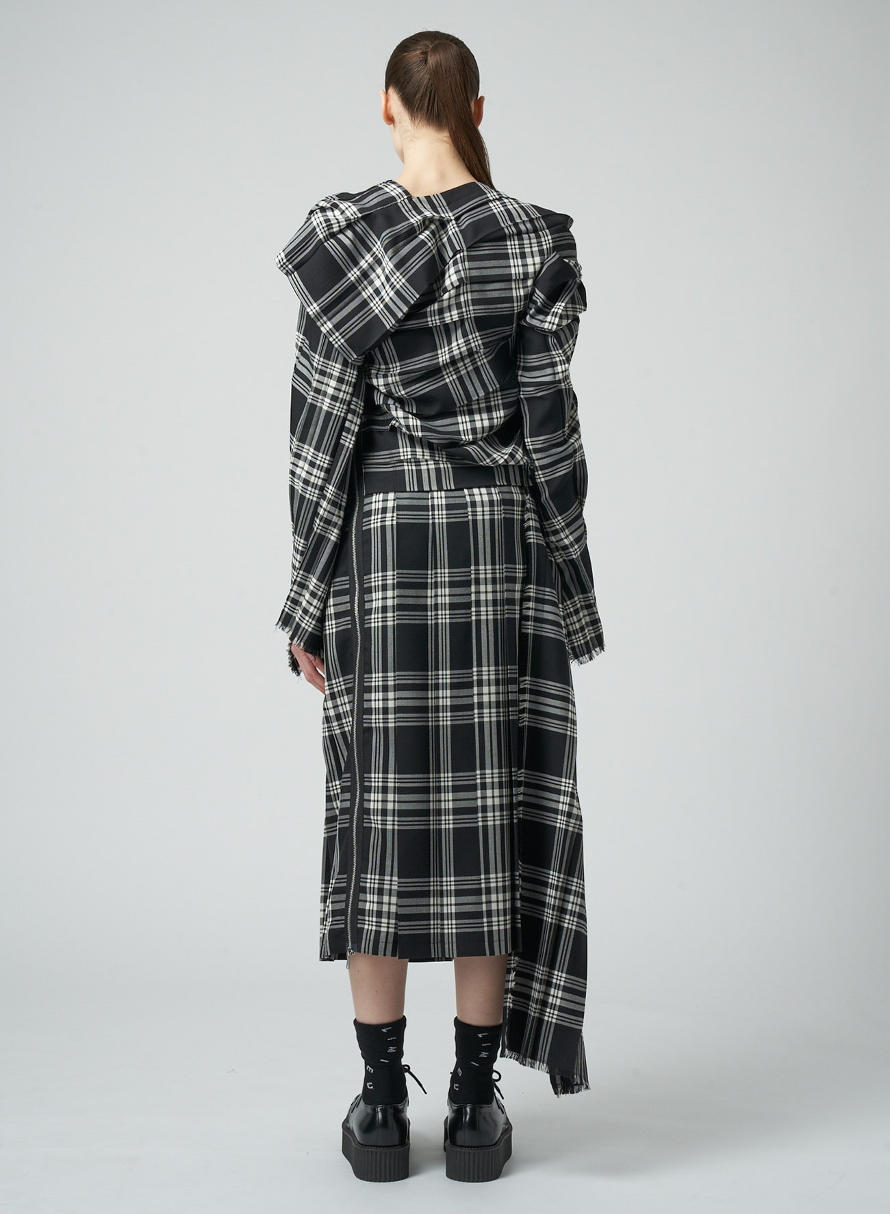 PLAID DRESS WITH TWISTED PLEATS