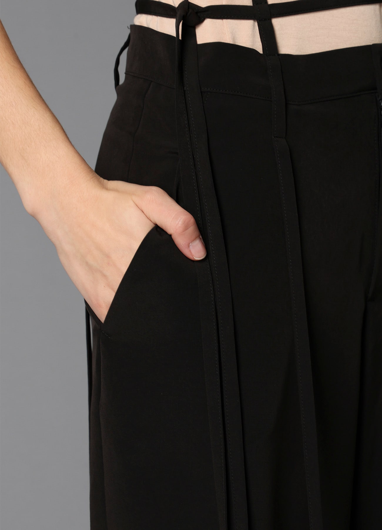 a HANGING STRAP PANTS