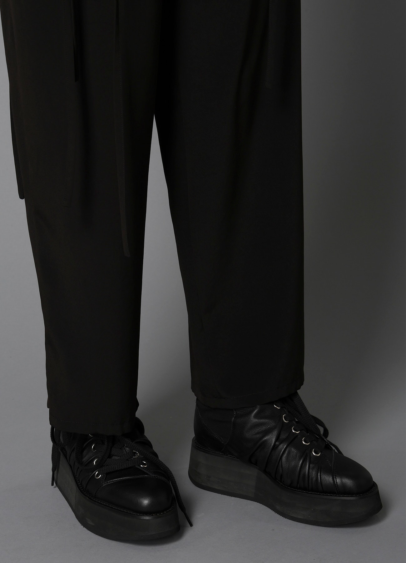 a HANGING STRAP PANTS