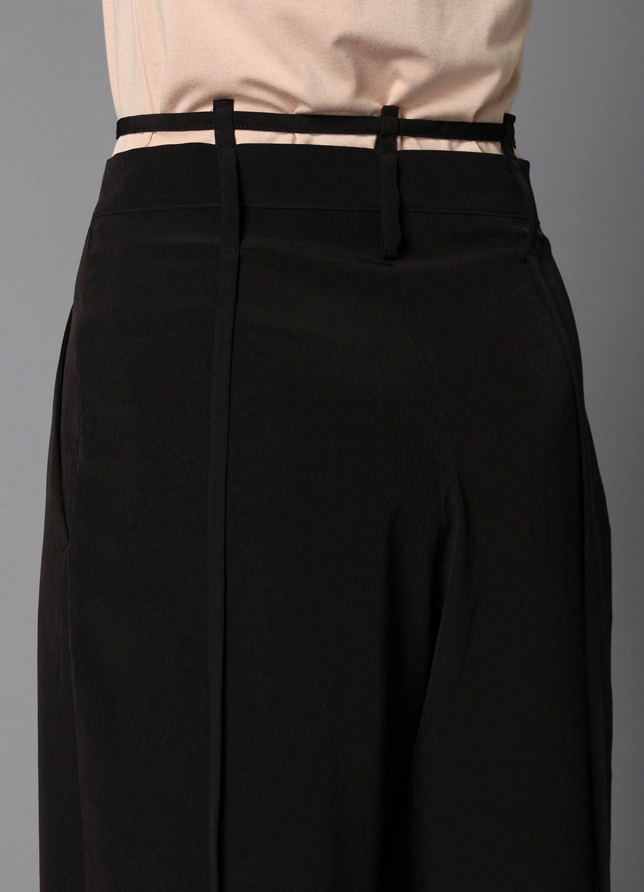 a HANGING STRAP PANTS