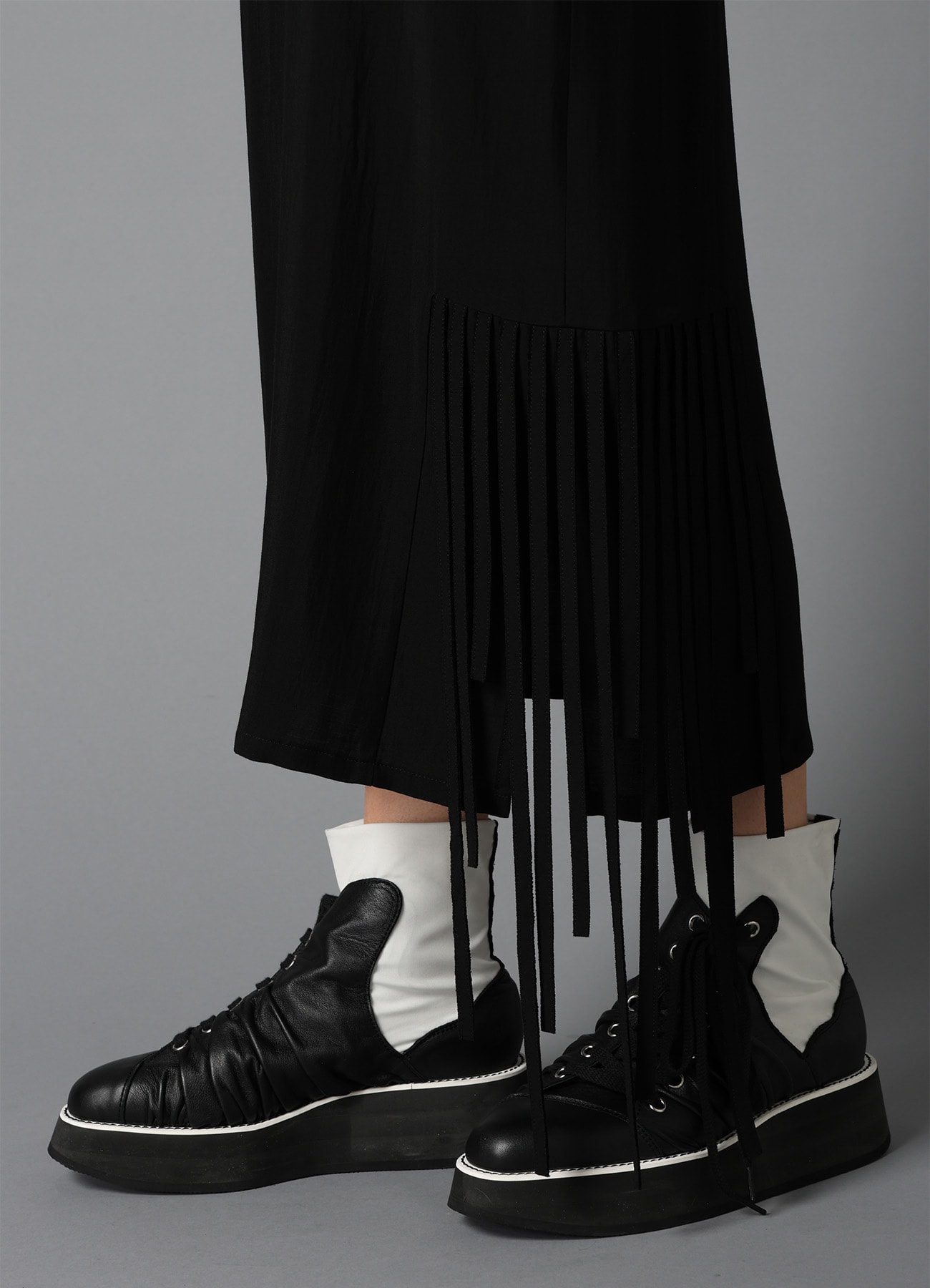 HIGH TWISTED GABARDINE FRINGE SKIRT