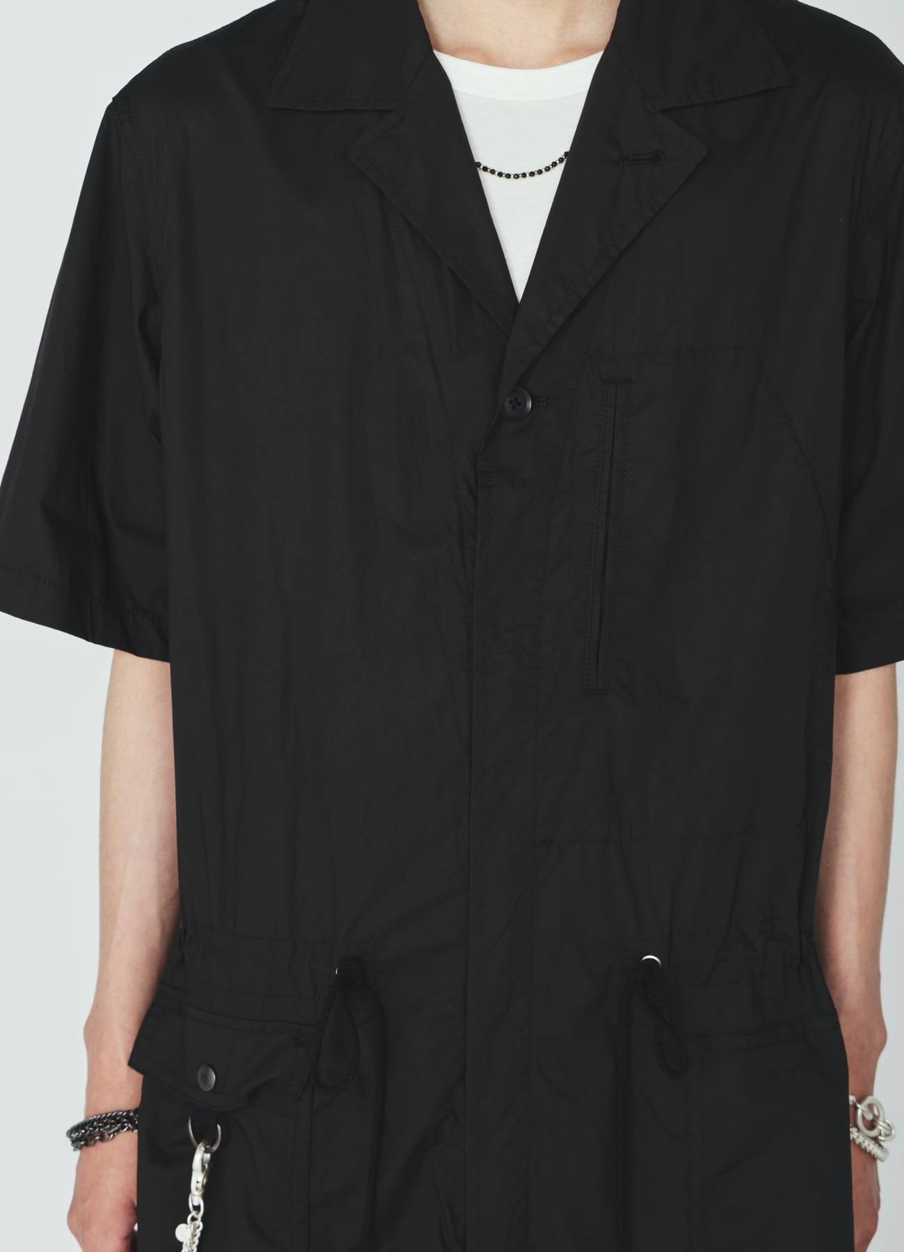COTTON TYPEWRITER SHORT-SLEEVE JUMPSUIT