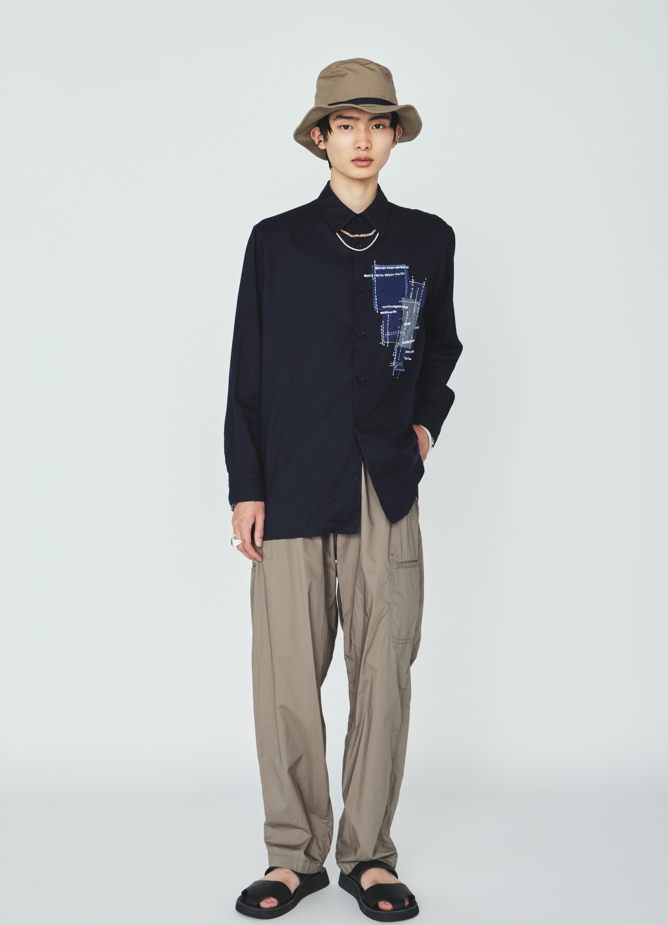 COTTON TYPEWRITER SIDE-POCKET TAPERED PANTS