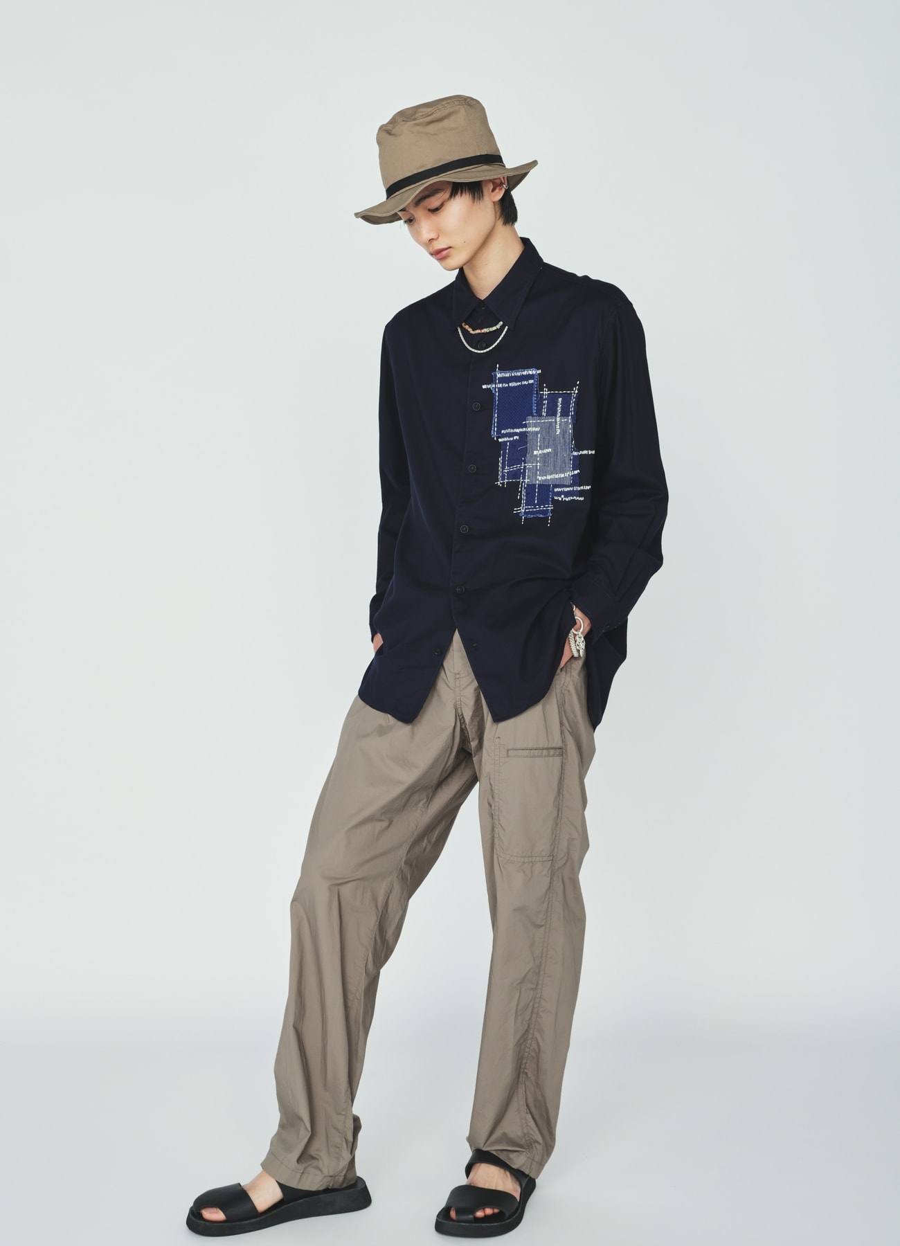 COTTON TYPEWRITER SIDE-POCKET TAPERED PANTS
