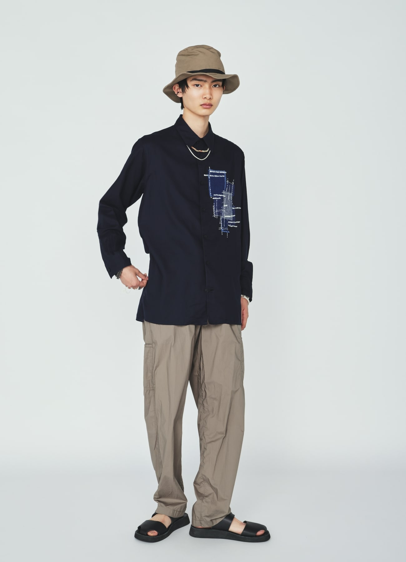 COTTON TYPEWRITER SIDE-POCKET TAPERED PANTS
