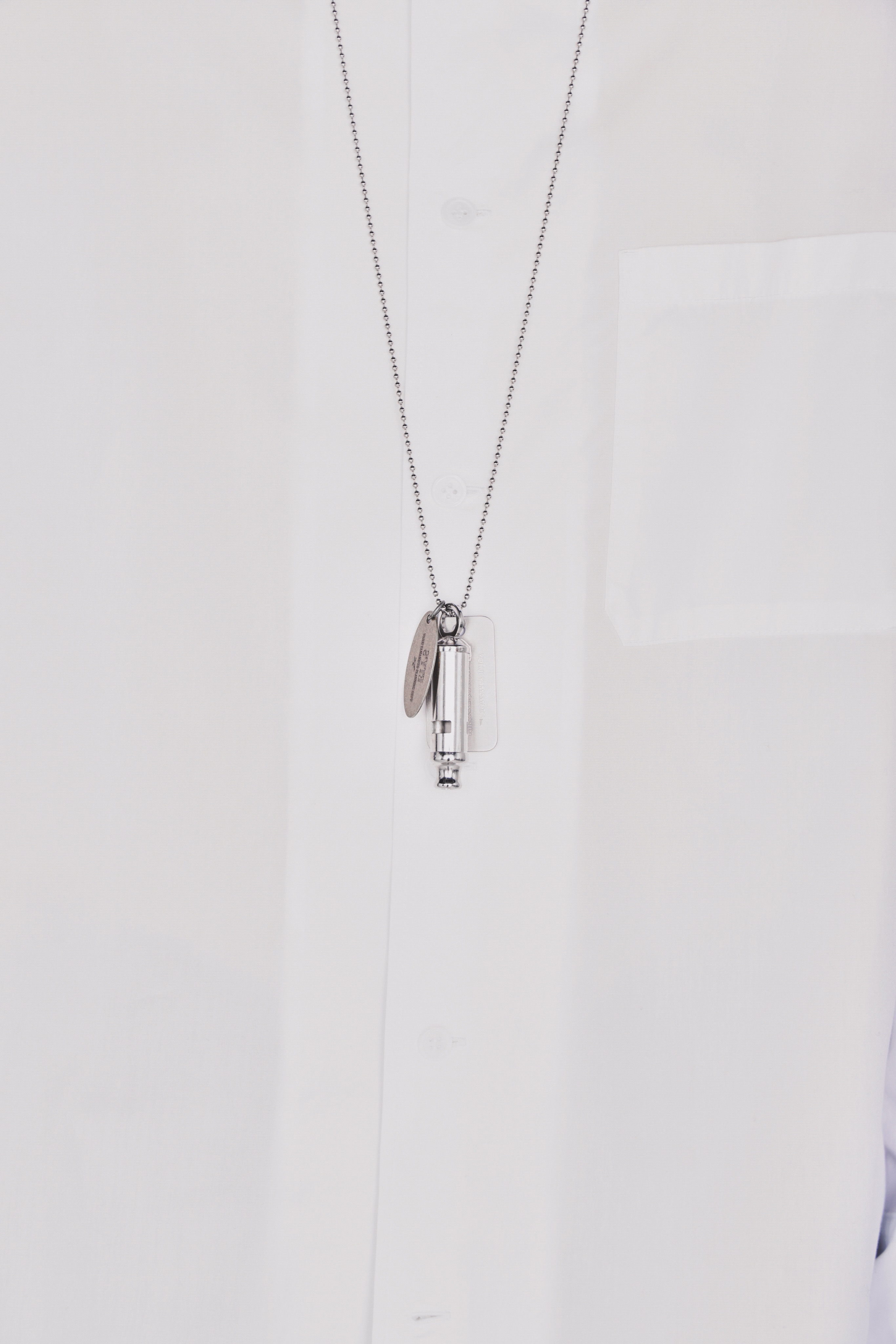 STAINLESS STEEL WHISTLE NECKLACE WITH BRASS TAG