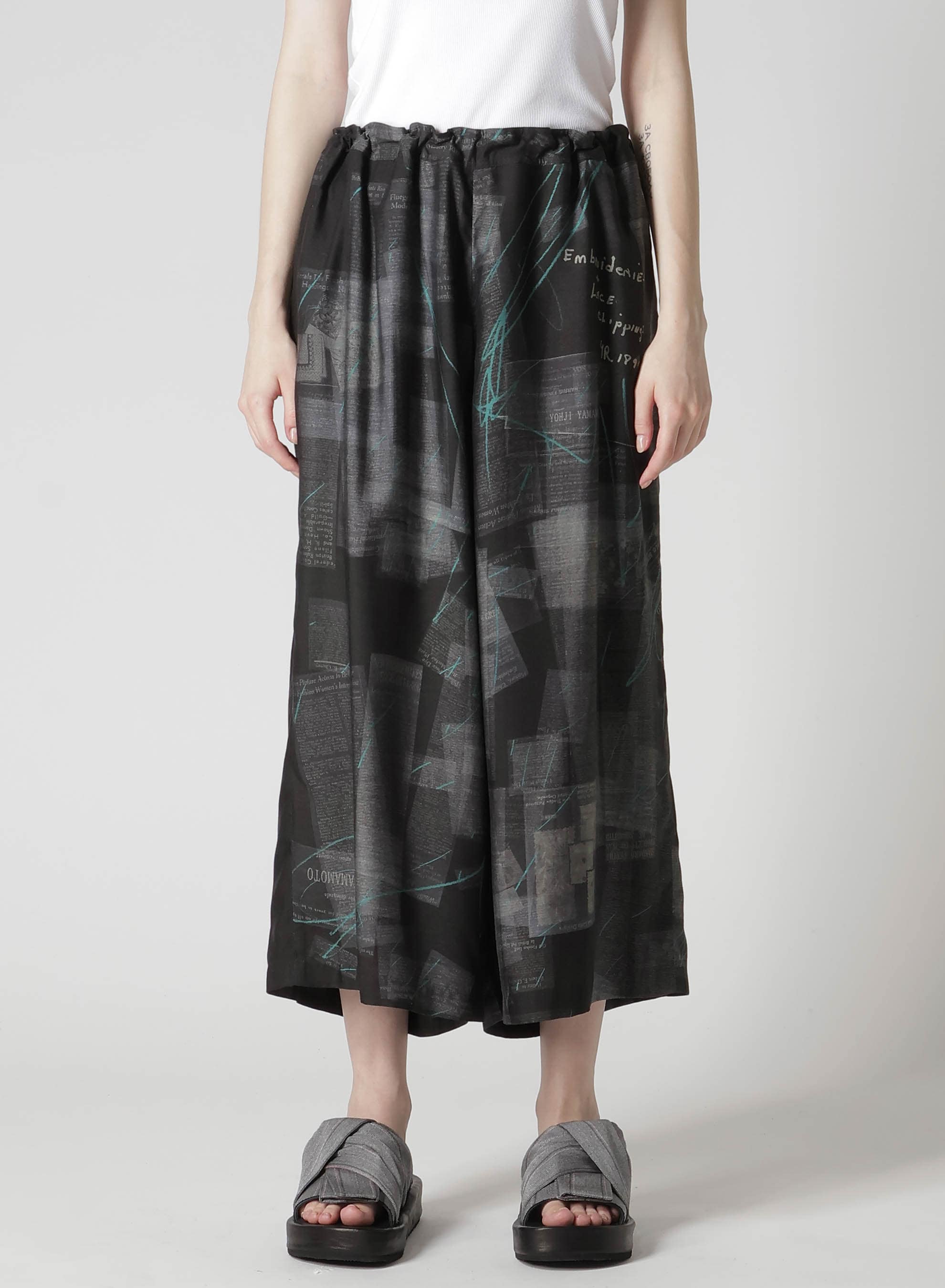 CUPRO DUNGAREE TWILL NEWSPAPER PRINT PANTS